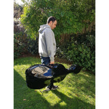 Man holding Crossrock CRF1000CEFBK black fibreglass cello case by handle