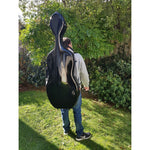 Man wearing Crossrock CRF1000CEFBK fibreglass cello case as a backpack