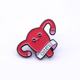 Cuterus pin - pink uterus cartoon with smiley face and "Cuterus" written at bottom