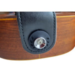 Black safety lock strap block on ukulele strap